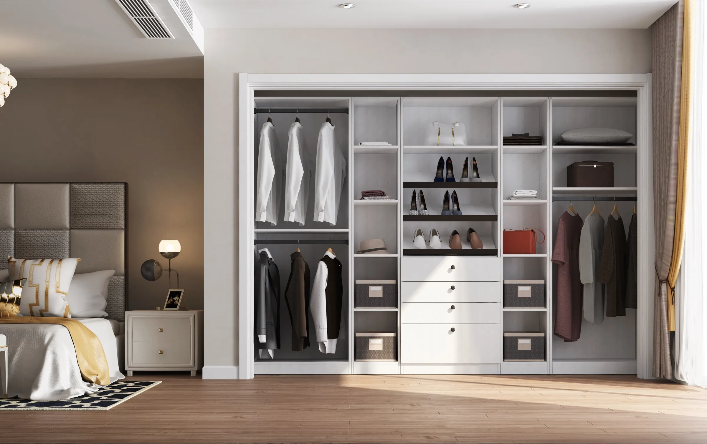 Wide cream-white reach-in closet with open shelving, a four-drawer center bank, fabric storage bins, and double hanging sections