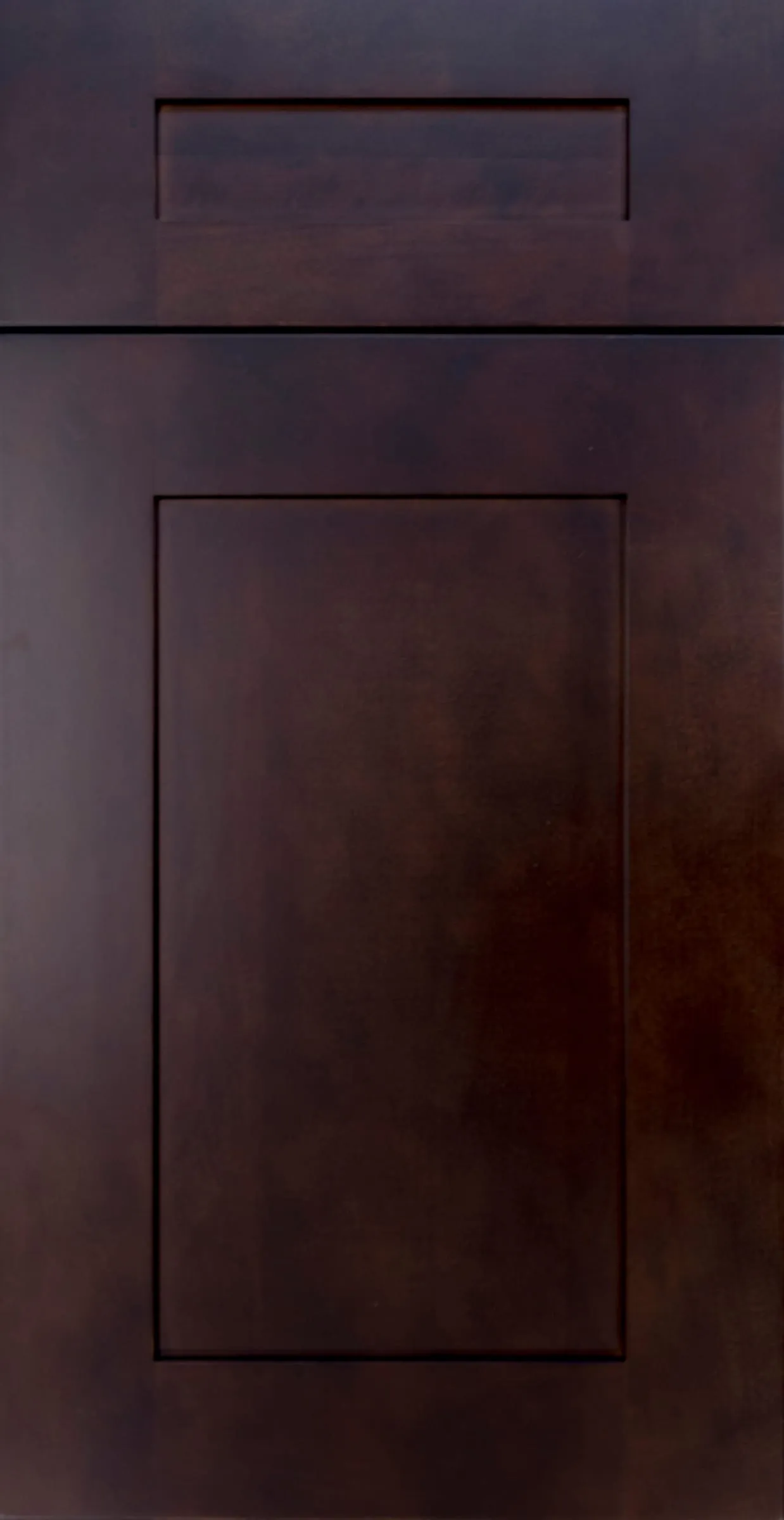 Dark espresso-stained shaker door and drawer with visible wood grain