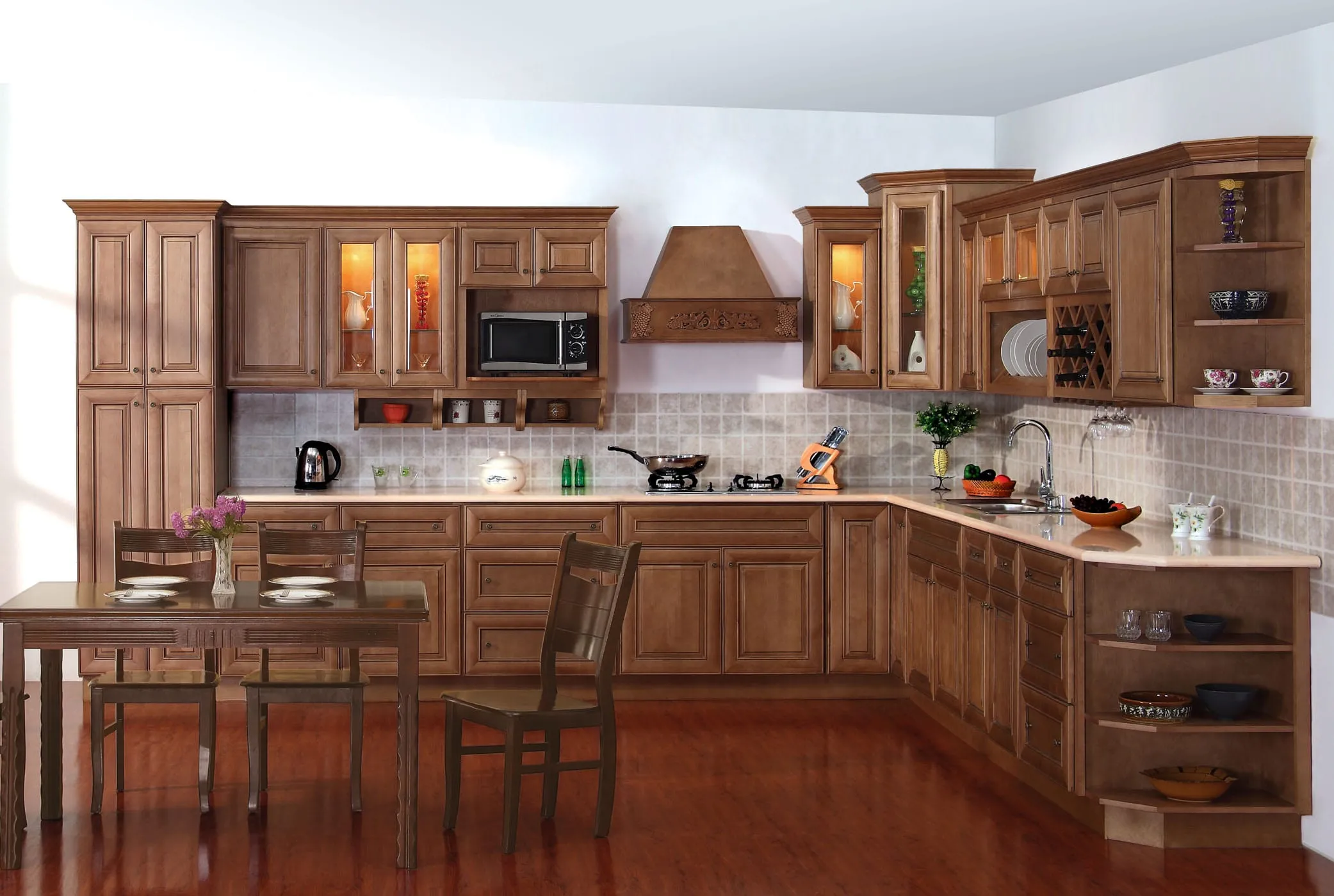 Full ginger-stained traditional kitchen with a wine rack, plate rack, and glass display cabinets
