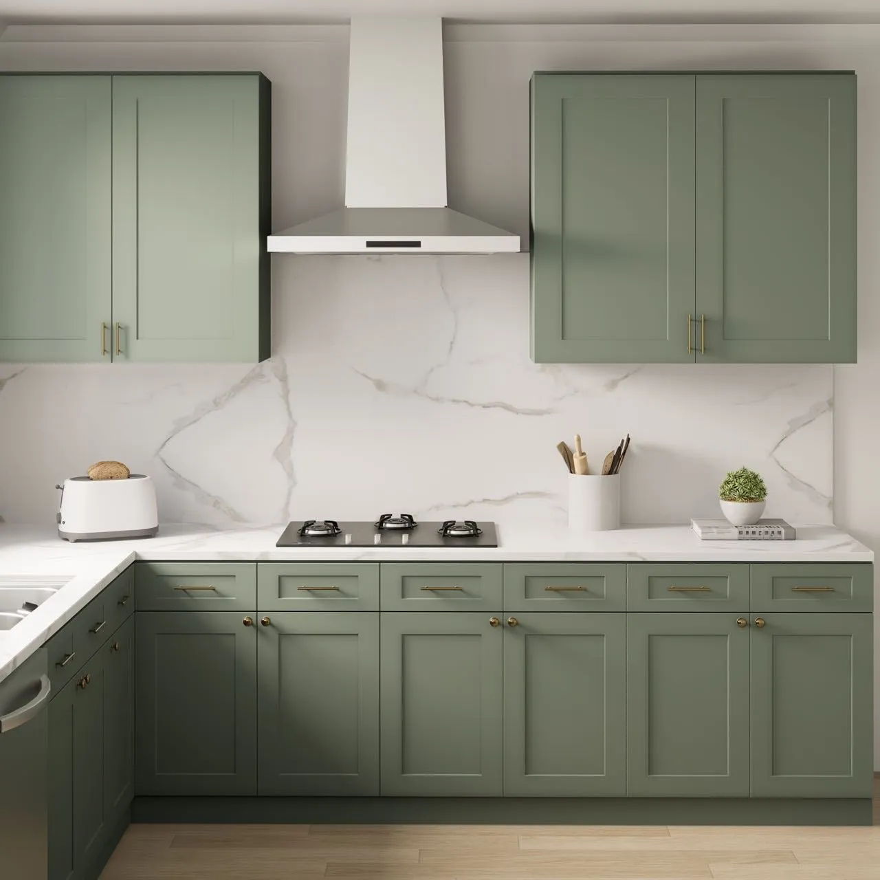 Sage-green shaker kitchen elevation with a vent hood and marble backsplash